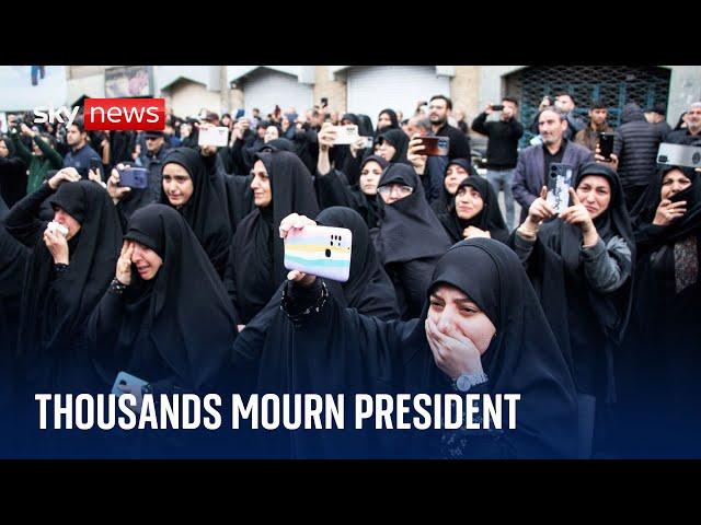 Thousands mourn Iran's president, while others celebrate his death