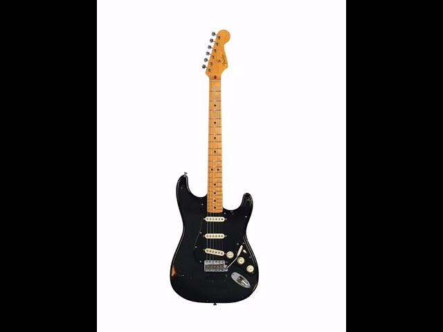 A SOLID-BODY ELECTRIC GUITAR, STRATOCASTER, KNOWN AS ‘THE BLACK STRAT’