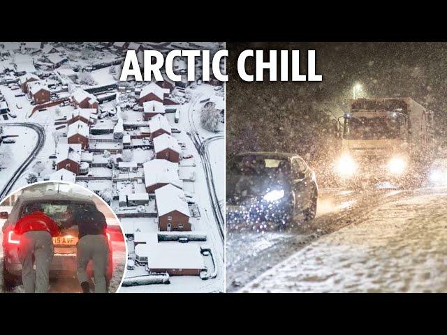 Brits battle through sheets of snow as temperatures plunge to -8C sparking travel carnage