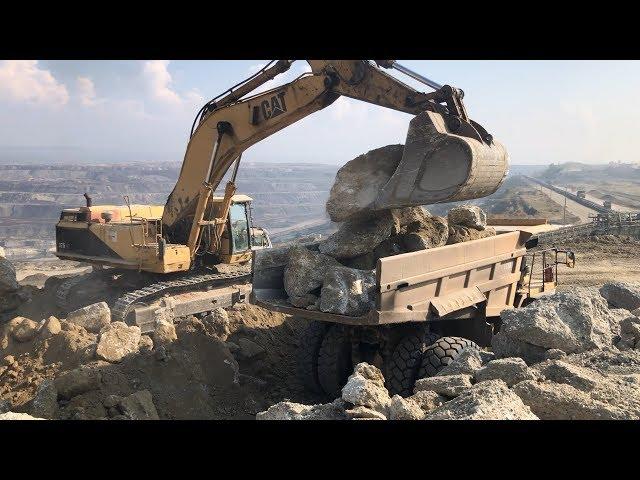 Caterpillar 375 LME Excavator Loading Rocks On Caterpillar Dumpers - Sotiriadis\Labrianidis Mining