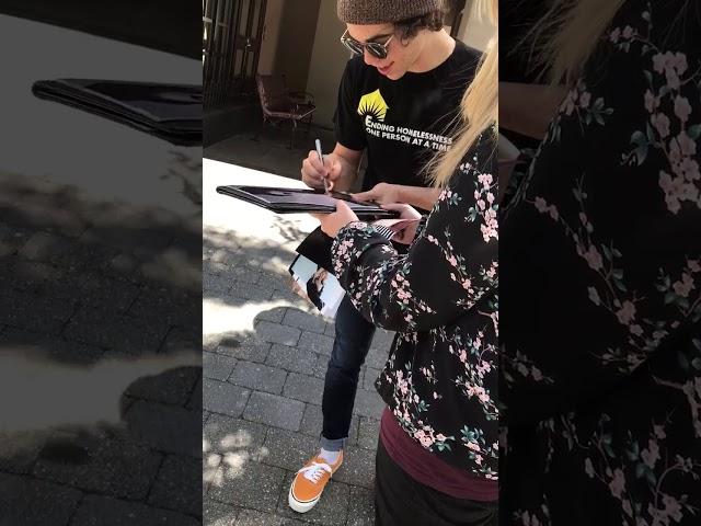 Cameron Boyce signing autographs during Descendants 3 filming