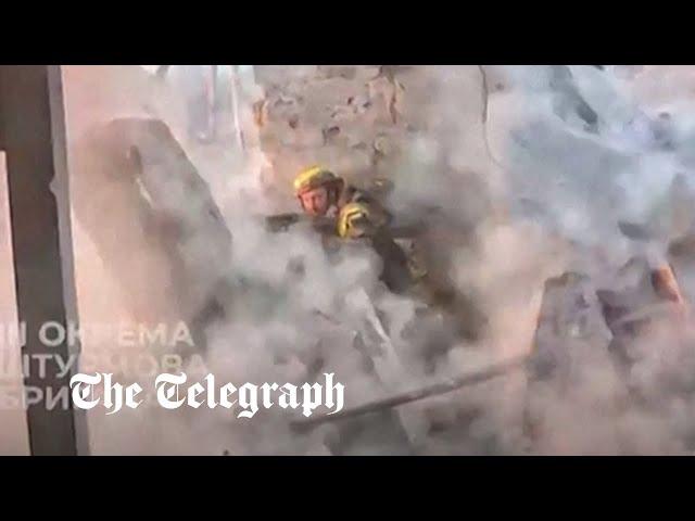 Ukrainian soldiers dive for cover as shells explode all around them near Bakhmut