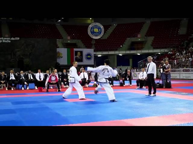 Evgeny Otsimik (Rus) v Ri Chung Il (DPRK). -57kg Male Sparring Final. ITF World Championships 2013