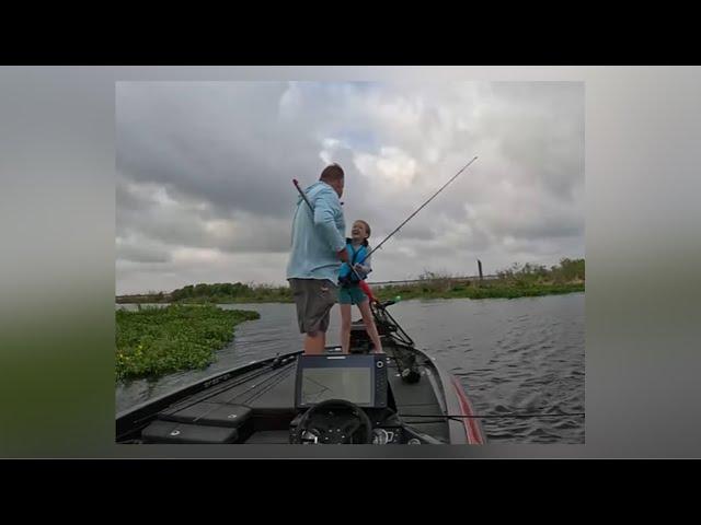 Dad and daughter share priceless moment while fishing