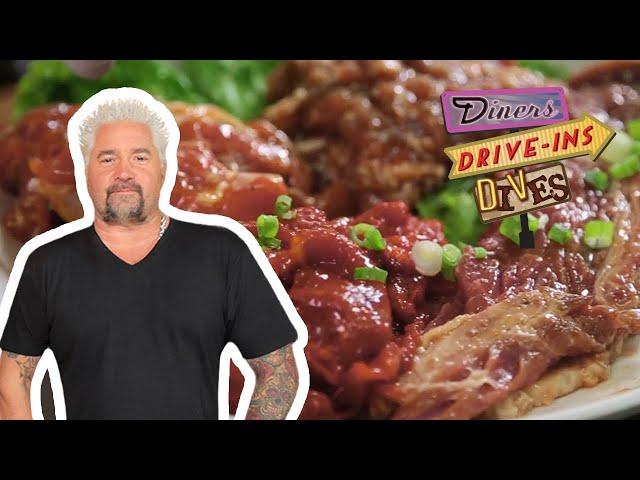 Guy Fieri Eats All-You-Can-Eat Korean BBQ | Diners, Drive-Ins and Dives | Food Network