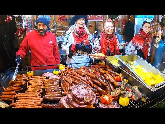 Street Food in Bucharest, Romania. Grilled Meat, Pork Shanks, Giant Sausages