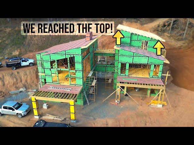 Construction of a MEGA sized Modern Home PT 53 | outrigger roof overhang framing