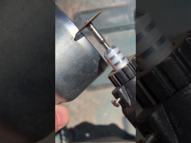 $9 harbor freight drill master dremel tool.  Will it cut exhaust pipe?