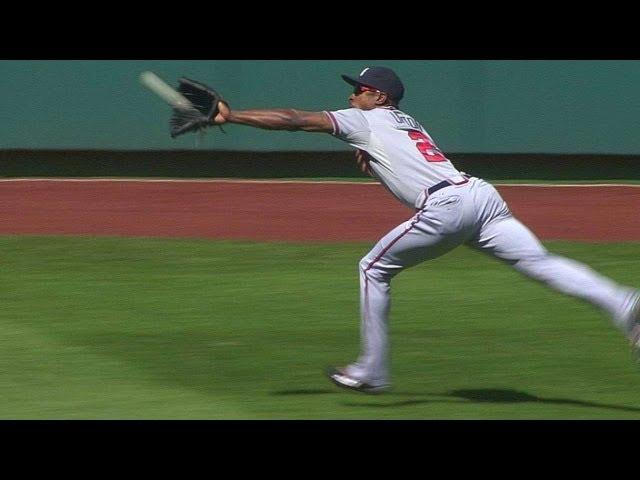 ATL@WSH: B. Upton runs down sinking liner in the gap