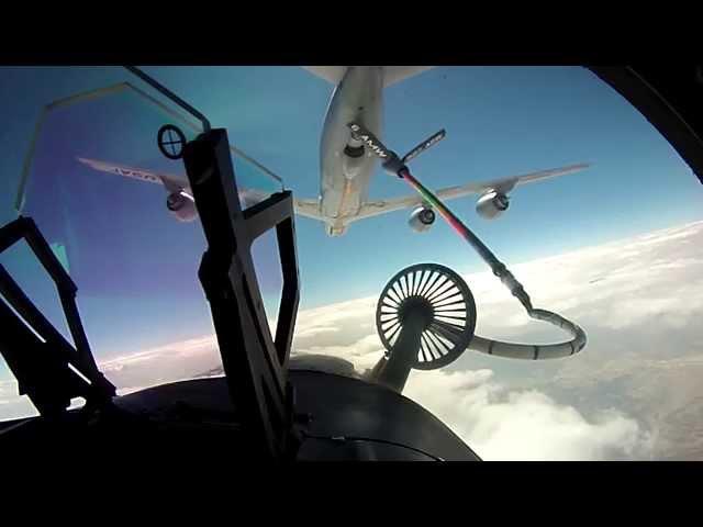 F18 Pilot Refueling Mid-Air