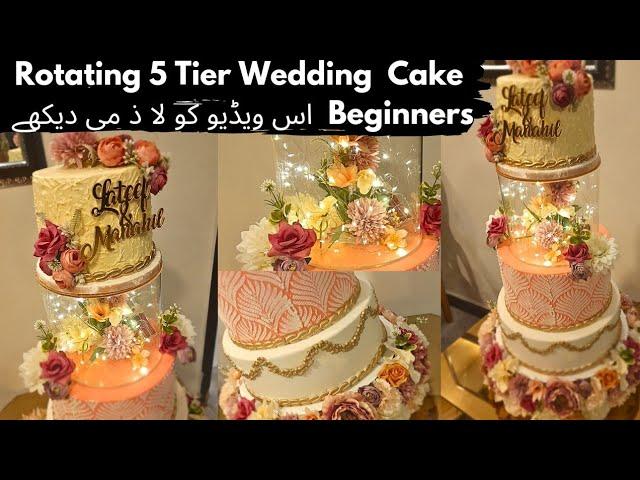 Complete guide about 5 Tier Rotating Wedding Cake by Fatima Cuisine | Trending Rotating Cake