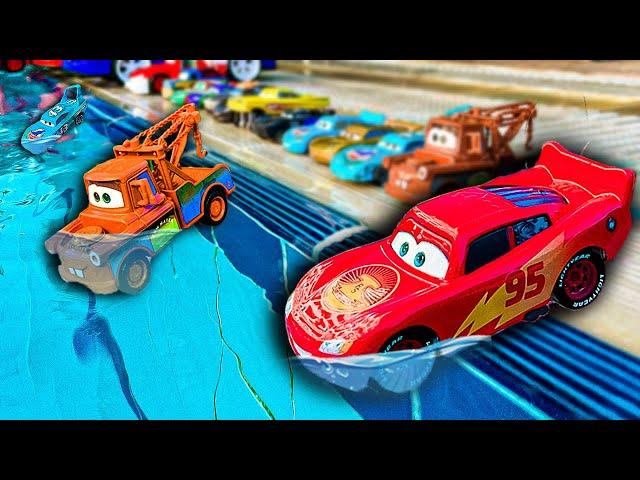 Disney Pixar Cars fall into the water: Lightning McQueen,Doc Hudson,Chick Hicks,Mater,Sally Carrera