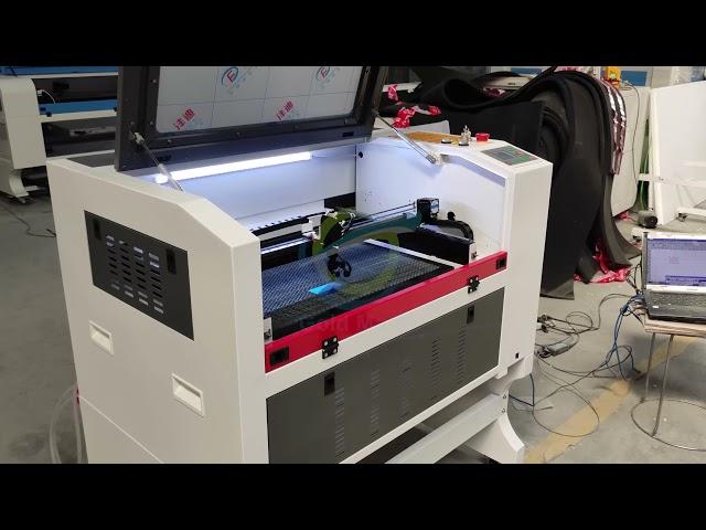 4060 co2 laser engraving and cutting machine show integrated with the latest ruida6442 control