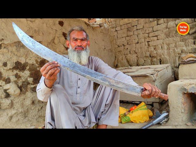 Talented Blacksmith making a Great Sword - The top works