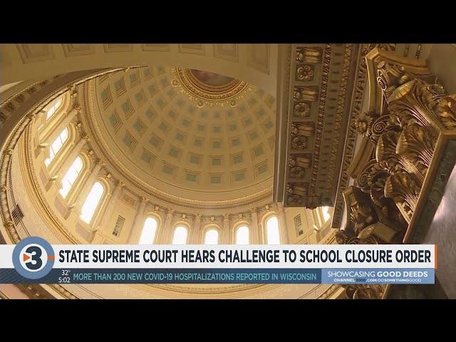 State Supreme Court hears challenge to school closure order