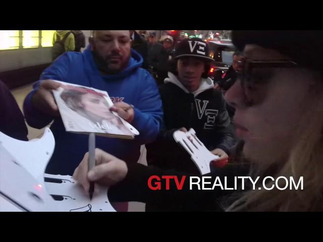 Adele surrounded by autograph seekers on GTV Reality