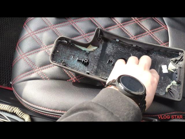Снятие и разбор переднего подлокотника на Рено Меган 3 или Рено Флюенс