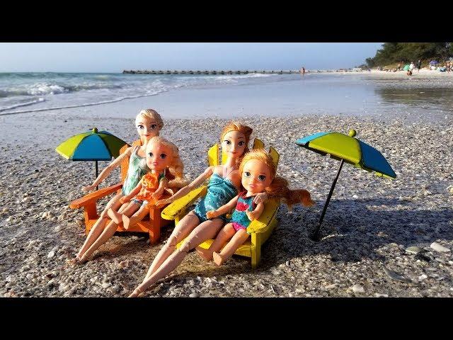 Elsa and Anna toddlers at the beach - prank - slide - boat - dog - water fun - splash