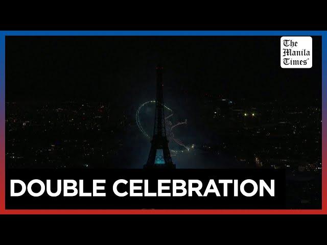 Eiffel Tower fireworks mark France's National Day with Olympic twist