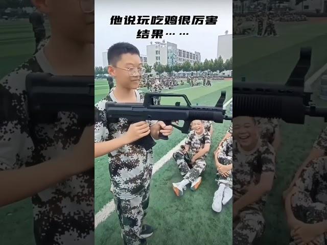 Chinese kid using QBZ-95 Training model in a hilarious way