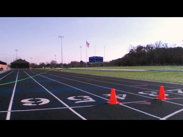 James Jenkins Jr running a 60 meters-hand time 5.95