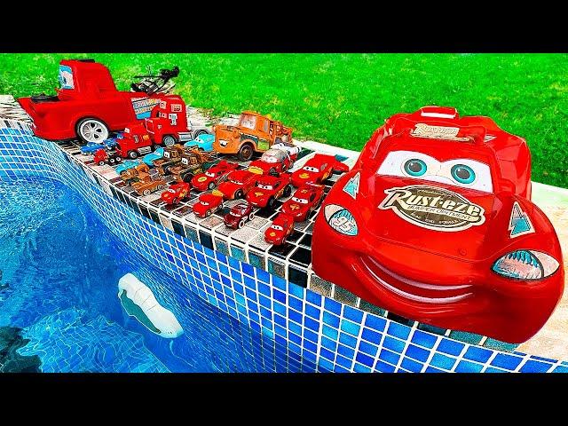 Disney Pixar Cars falling into deep pool, Lightning McQueen, Tow Mater, Mack, Sally, Francesco