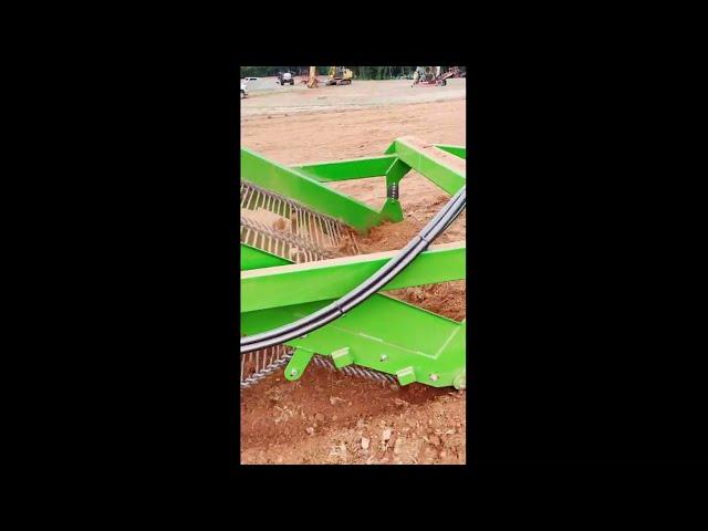 Lenco 5ft Stone Picker operating in red clay w/ clods