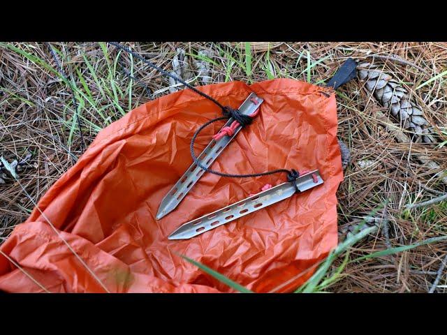 Survival Shelter Hack: Keep Your Tarp in Place During a Storm, Using tent pegs in loose dirt