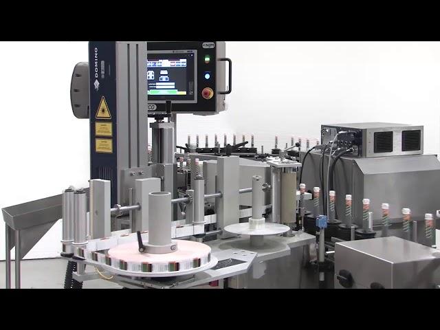 Model 130 BRONCO Labeler for Products in Pucks - NJM Labeling Systems