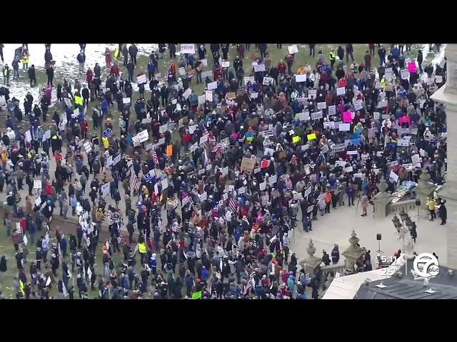 Anti-Trump protesters rally in Lansing