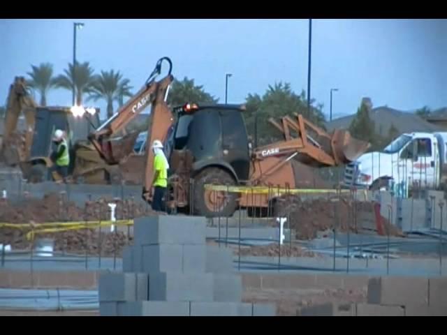 CAT and CASE Loader Backhoes Working on Foundations