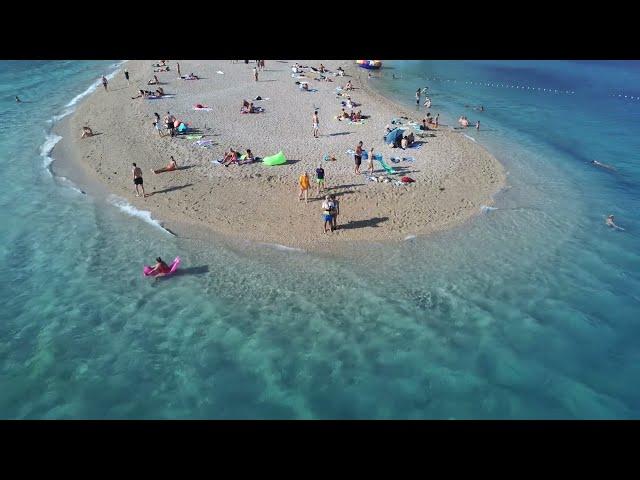 Standing at the edge of Golden Horn beach.. Split, Croatia