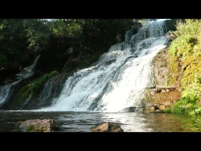 Power of Water. In the center of the biggest waterfall in Ukraine