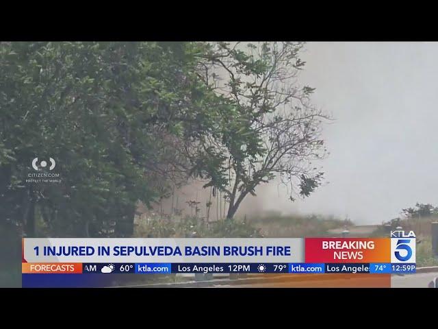 Los Angeles brush fire injures one, shuts down transit line amid countywide heat wave