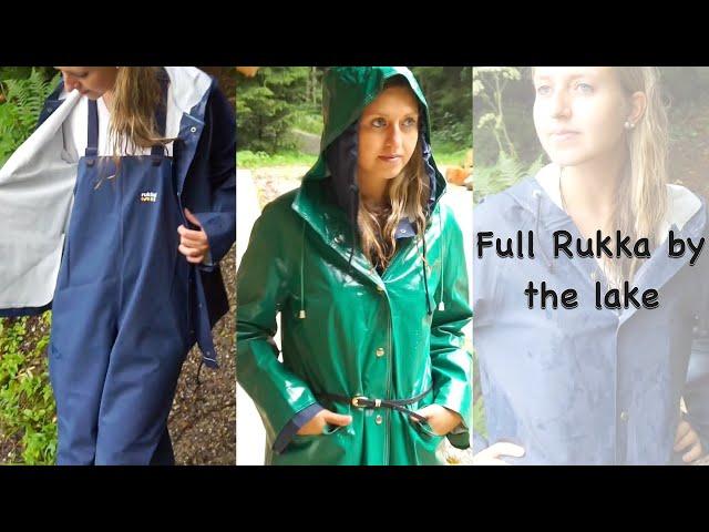 Blonde girl in Rukka rainwear and Hunter wellies wet in the rain