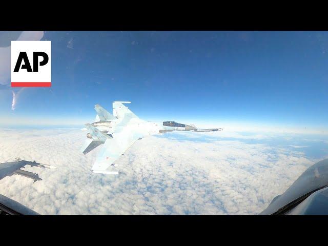 Video shows Russian jet flying within feet of US F-16 near Alaska