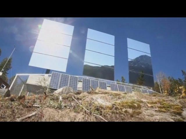 Giant mirrors reflect sunshine into dark Norway town of Rjukan