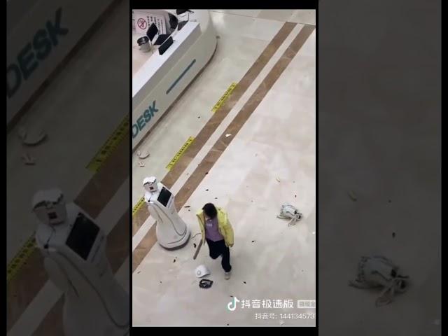 Job Threat and AI Rebellion : Chinese woman thrashing robot goes viral !!