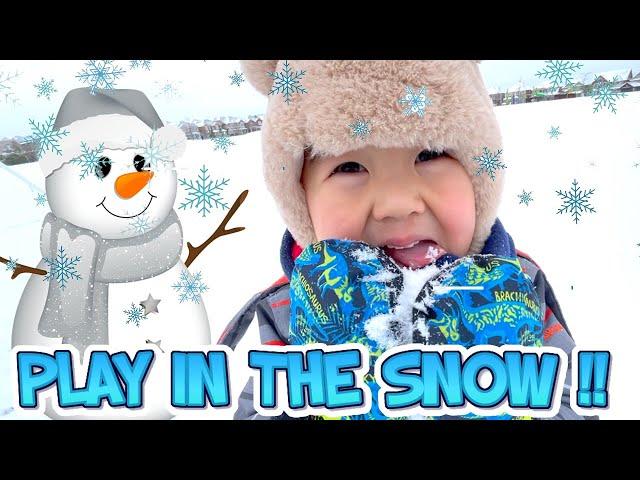 It's snowing outside! - Keeva & Kyler go snow sledding in the park on Christmas Day.