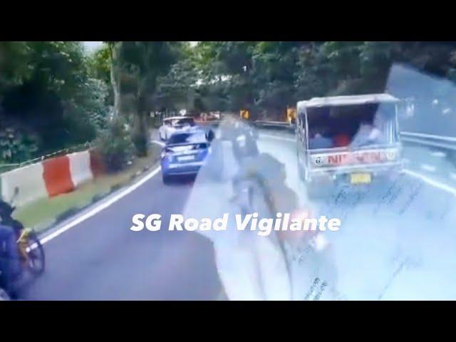 3jun2024 motorcyclist speeding  & lane splitting at the bend nearly skidded