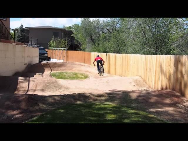 Pro Mountain Biker - Ross Schnell on his backyard pump track