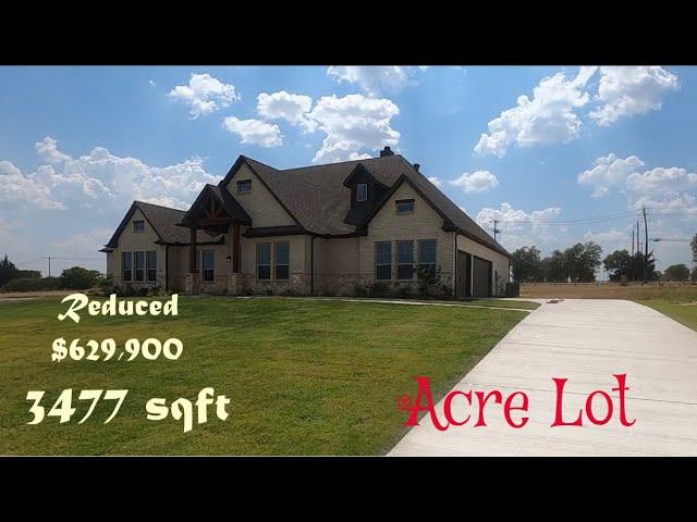 They reduced the price on this Sandlin Custom Home on an acre, should we get?