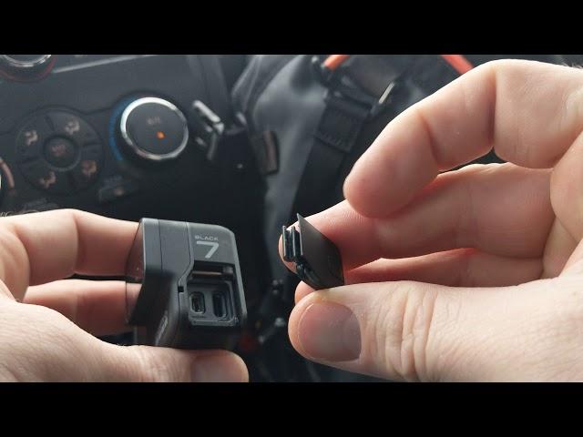 How to remove charger door on GoPro hero7 black USB charging while mounted