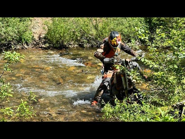 Descending a few thousand feet and ending the day with a creek crossing.