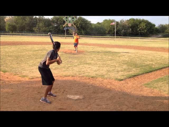 Cristian Hitting Baseball