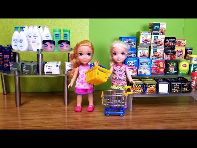 Elsa and Anna toddler at the store - shopping - food - supermarket - hide and seek