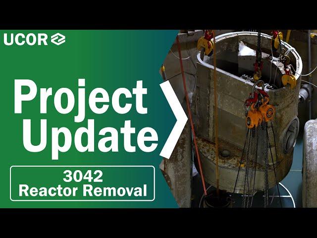 Project personnel discuss milestone achievement at the Oak Ridge Research Reactor