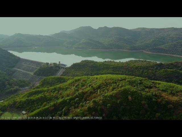 VIEW OF SIMLY DAM AND VALLEY ACROSS SPILLWAY