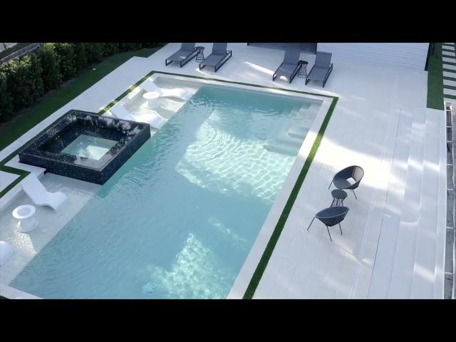 Large modern pool with double sun shelves - All Aqua Pools - New Smyrna Beach, Florida