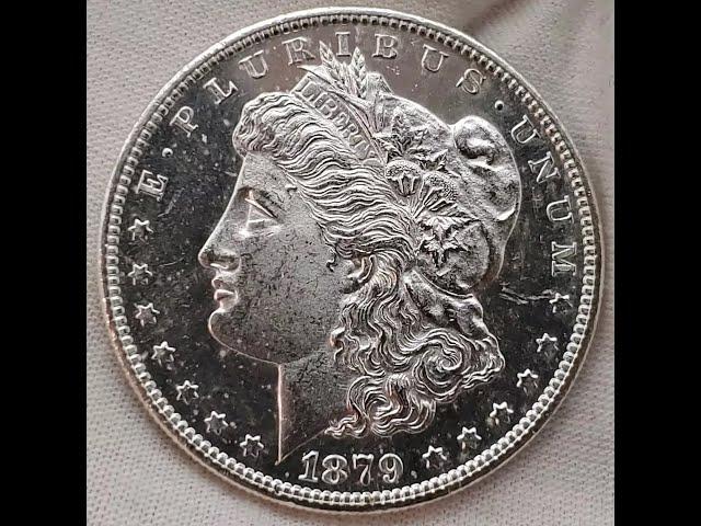 $1375 worth of Morgan Silver Dollars and a rainbow rim 1996 ASE for sale